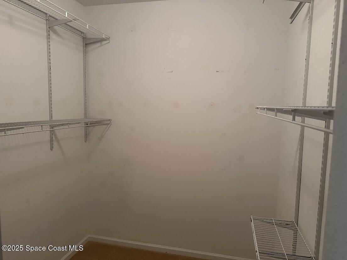 189 Wading Bird Circle Southwest Palm Bay, FL 32908 - Photo 8 of 23 Primary Closet