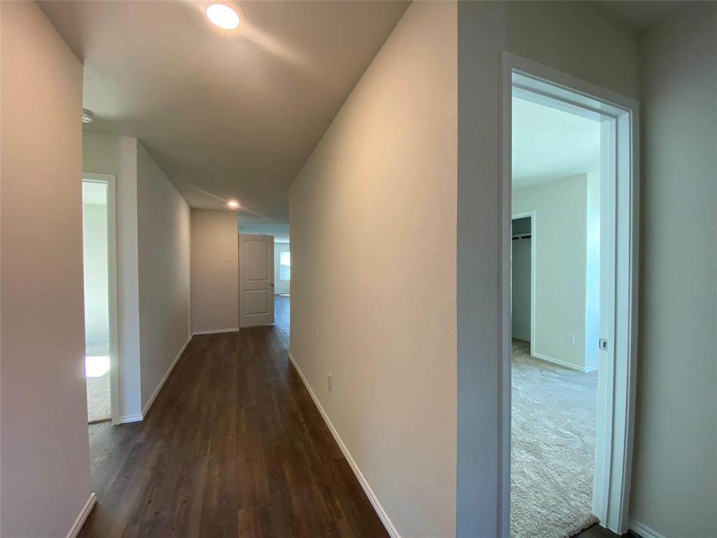 4408 Culrin Way Forney, TX 75126 - Photo 3 of 17 a view of hallway with wooden floor