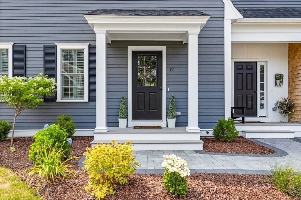 17 Farm Road Plymouth, MA 02360 - Photo 2 of 29 a front view of a house with potted plants