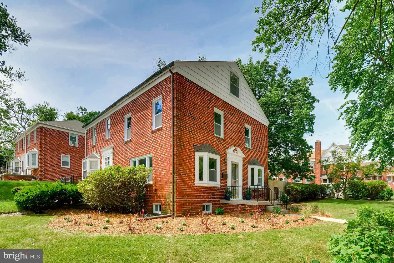 4823 Briarclift Road Baltimore, MD 21229 - Photo 1 of 30 a front view of house with yard