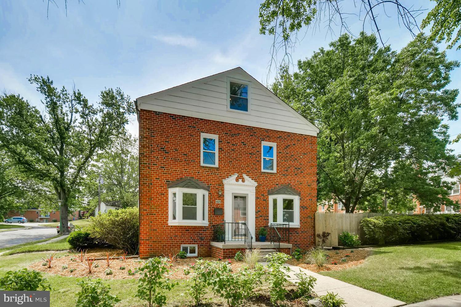 4823 Briarclift Road Baltimore, MD 21229 - Photo 2 of 30 a front view of a house with garden