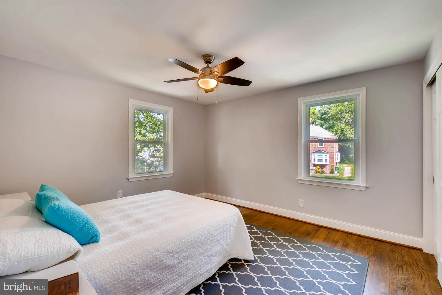 4823 Briarclift Road Baltimore, MD 21229 - Photo 13 of 30 a bedroom with a bed and a window