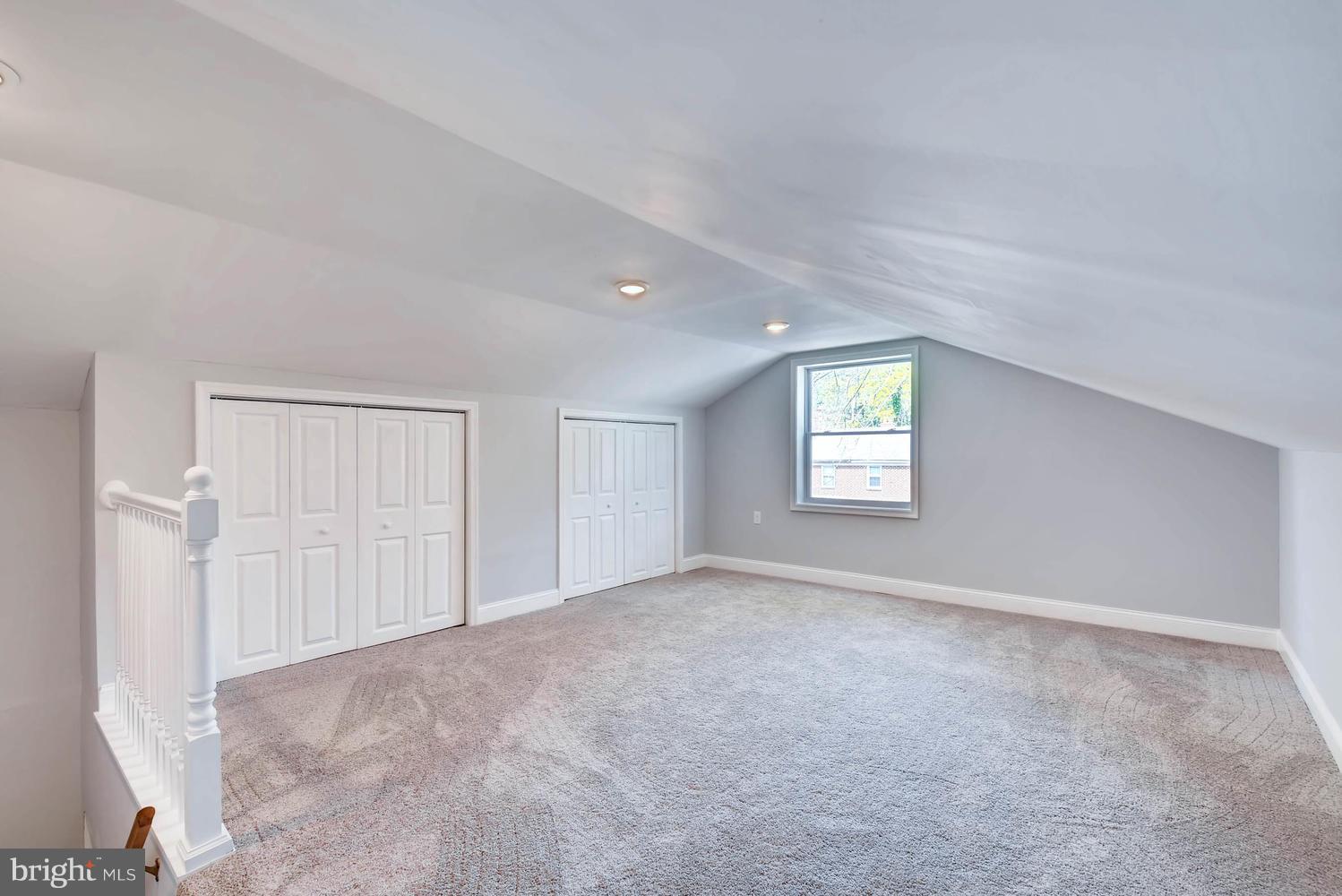 4823 Briarclift Road Baltimore, MD 21229 - Photo 19 of 30 an empty room with windows