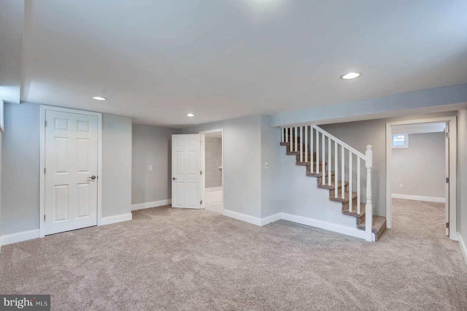 4823 Briarclift Road Baltimore, MD 21229 - Photo 25 of 30 a view of an empty room with stairs