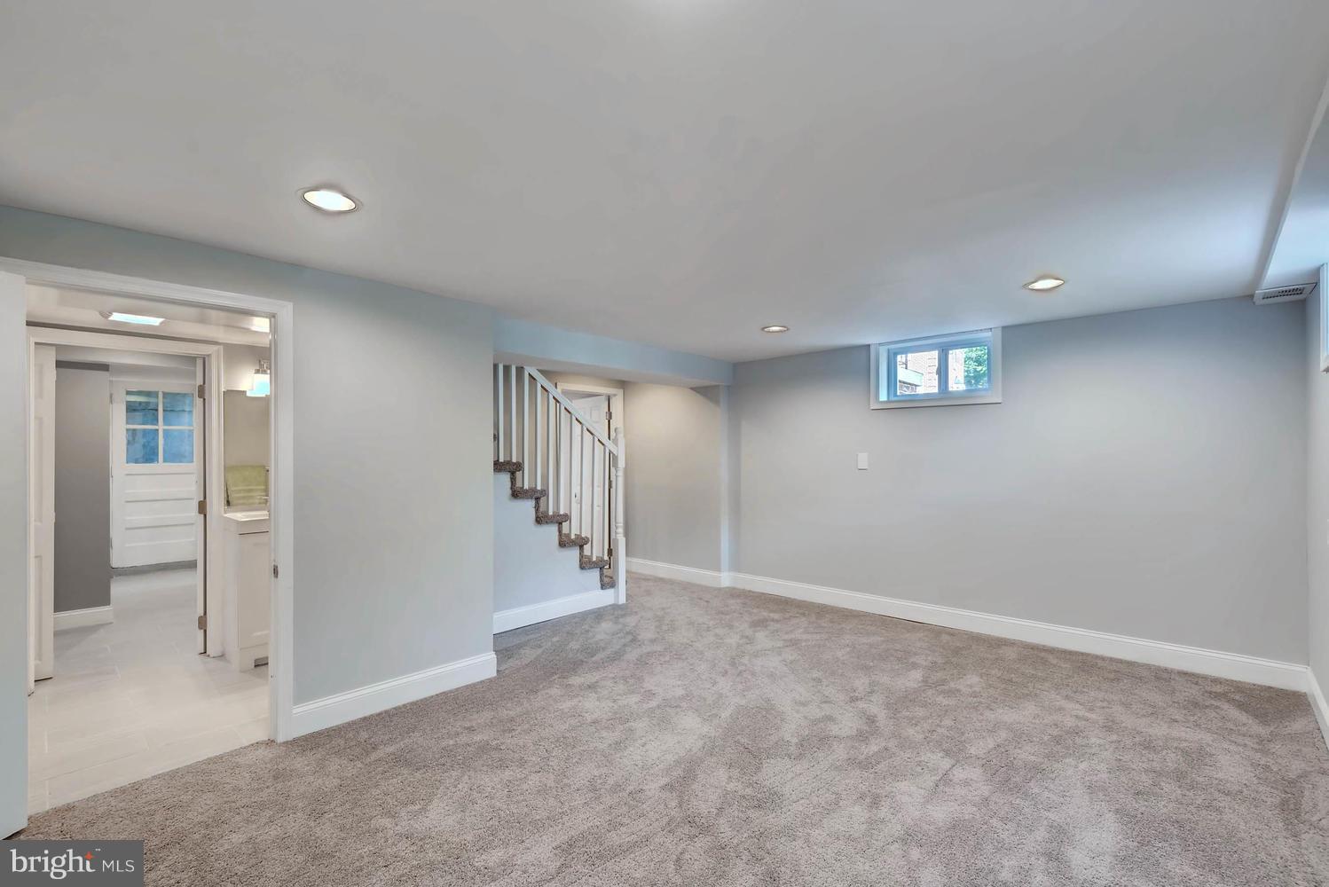 4823 Briarclift Road Baltimore, MD 21229 - Photo 26 of 30 an empty room with windows