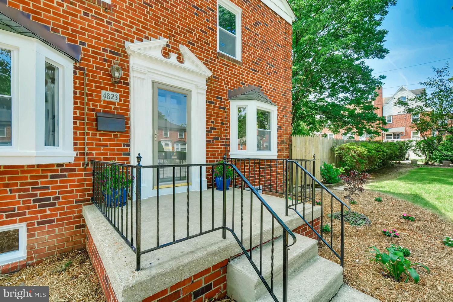 4823 Briarclift Road Baltimore, MD 21229 - Photo 30 of 30 a view of a balcony with a floor to ceiling window and garden