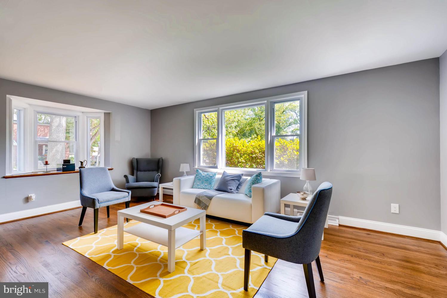 4823 Briarclift Road Baltimore, MD 21229 - Photo 4 of 30 a living room with furniture and a window