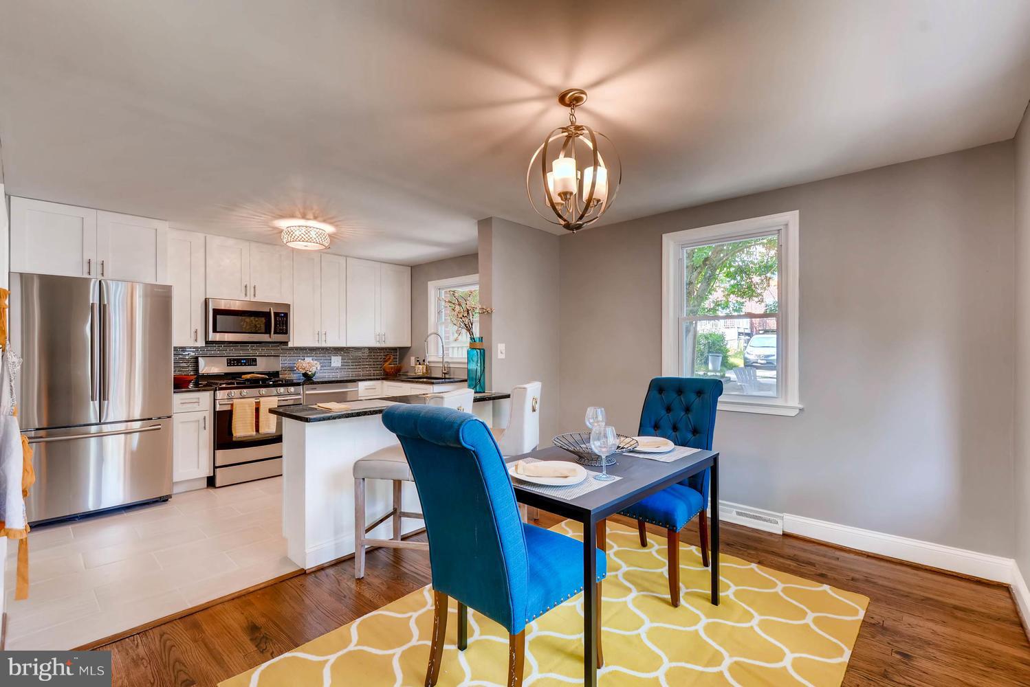 4823 Briarclift Road Baltimore, MD 21229 - Photo 8 of 30 a view of a dining room with furniture
