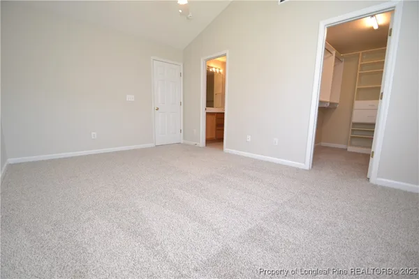 a view of an empty walk in closet
