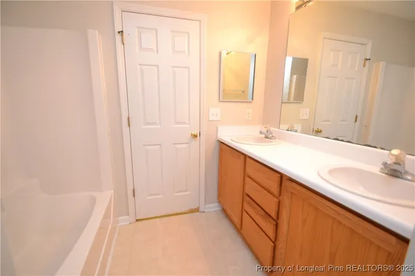 a view of a park and trees in the background