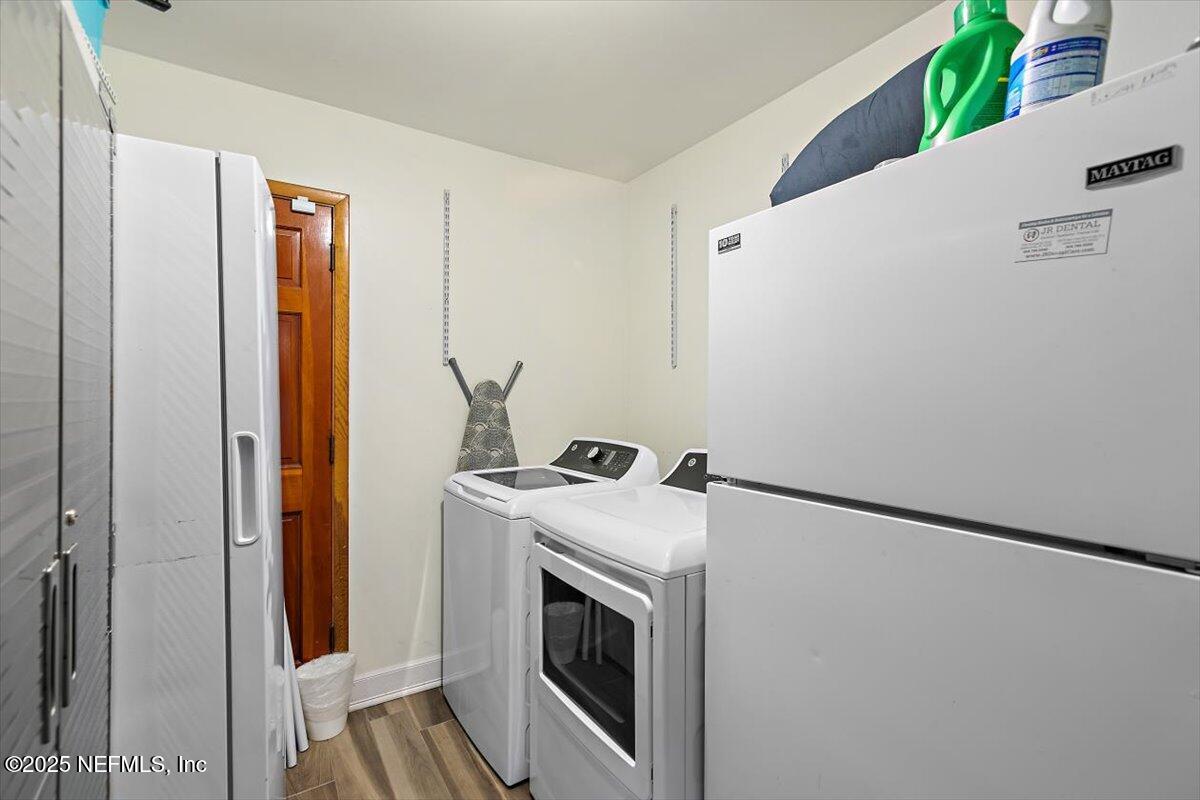 898 Perkins Place Jacksonville, FL 32221 - Photo 18 of 21 a utility room with dryer and washer