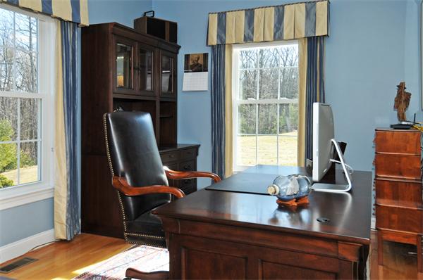 18 Wilkes Road Rowley, MA 01969 - Photo 13 of 29 a view of a workspace with furniture and a window