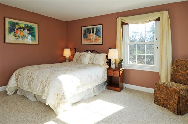 18 Wilkes Road Rowley, MA 01969 - Photo 23 of 29 a bedroom with a bed and a window