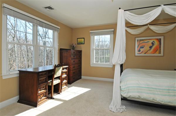 18 Wilkes Road Rowley, MA 01969 - Photo 24 of 29 a bedroom with a bed and a window