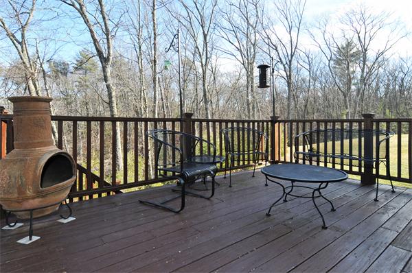 18 Wilkes Road Rowley, MA 01969 - Photo 26 of 29 a view of balcony with wooden floor and outdoor seating