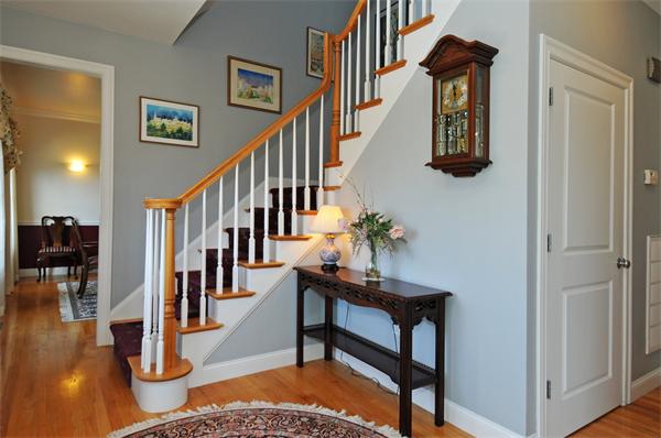 18 Wilkes Road Rowley, MA 01969 - Photo 3 of 29 a view of entryway and hall with wooden floor