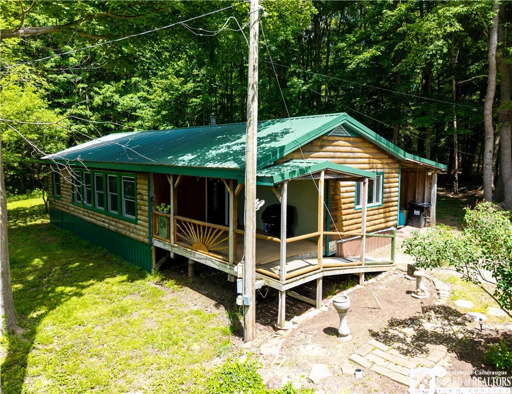 8961 Flucker Hill Road Villenova, NY 14138 - Photo 1 of 26 Front corner of home w/porch