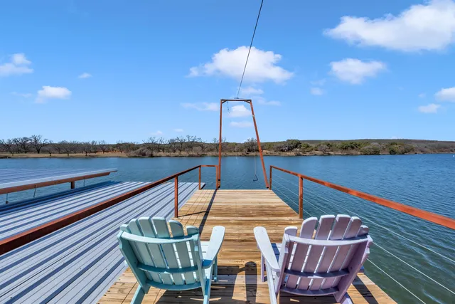 a view of swimming pool with a patio