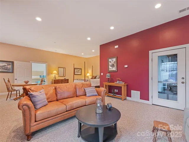 a view of a kitchen with furniture and chandelier