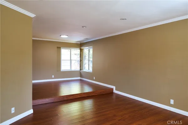 a kitchen with a sink and a refrigerator