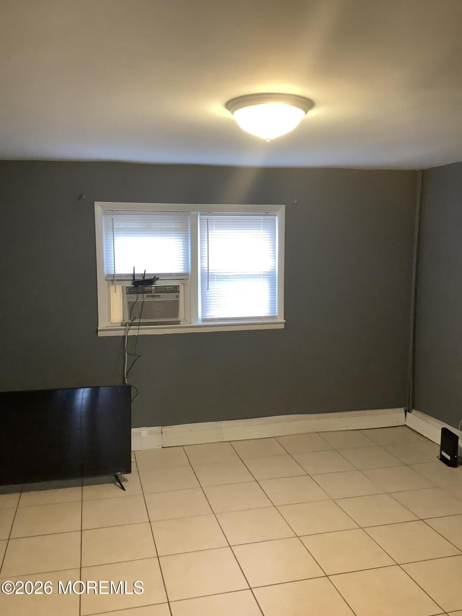 242 1st Street Keyport, NJ 07735 - Photo 8 of 23 a view of an empty room