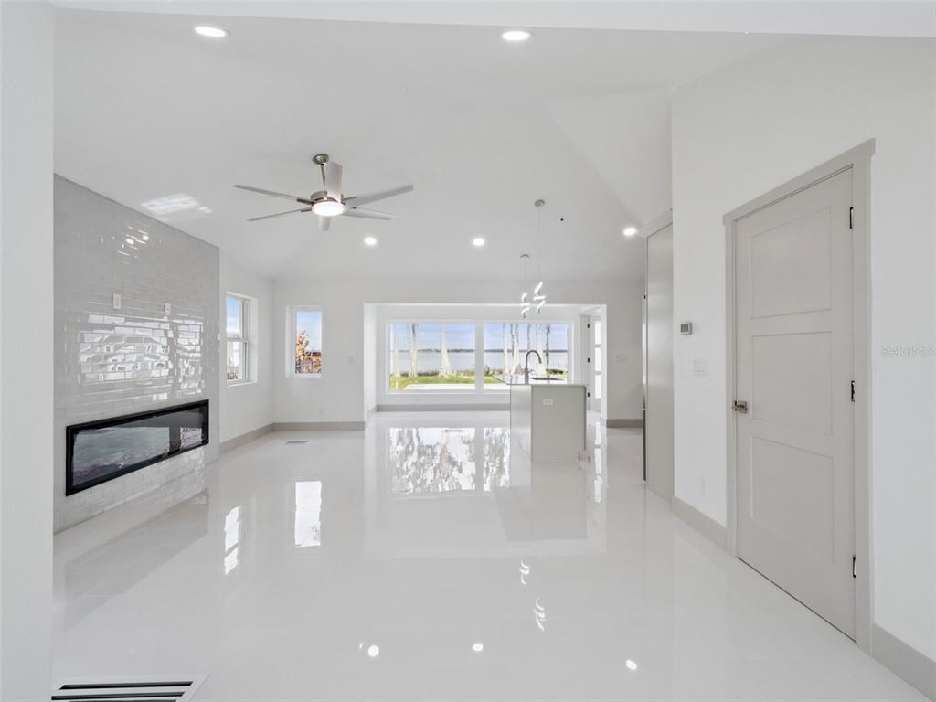 28055 Leuty Road Yalaha, FL 34797 - Photo 15 of 39 a view of kitchen with refrigerator and window