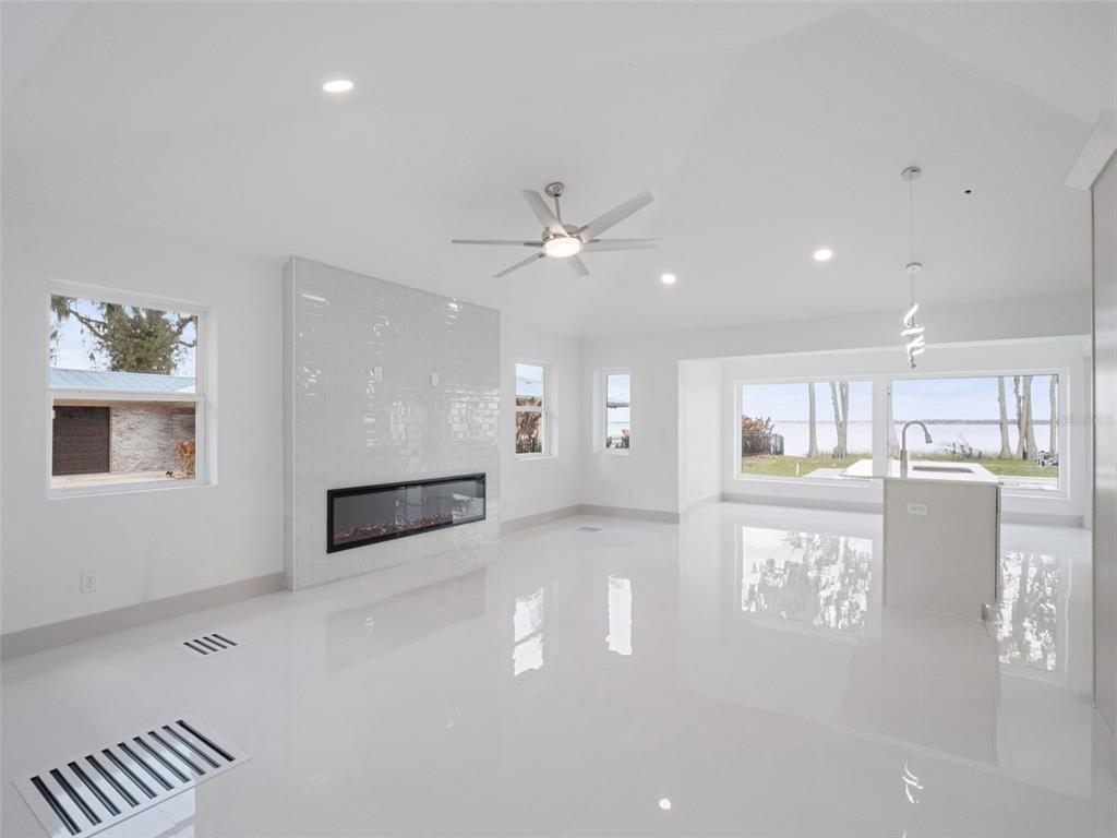 28055 Leuty Road Yalaha, FL 34797 - Photo 16 of 39 a view of kitchen and hall with a large window