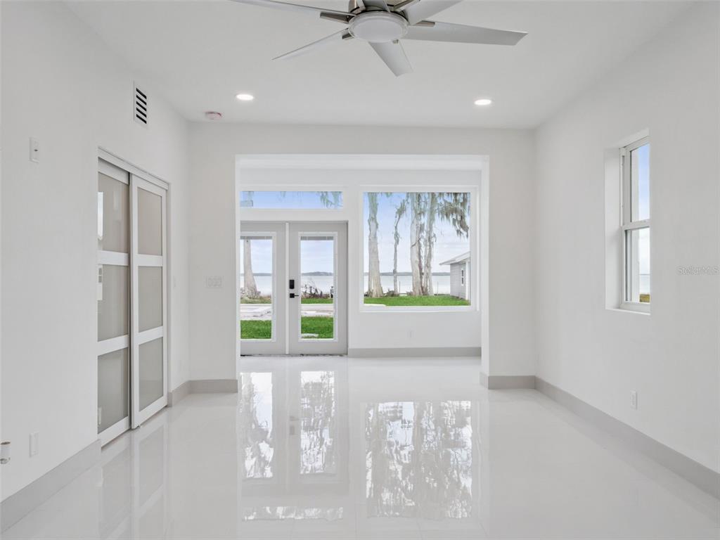 28055 Leuty Road Yalaha, FL 34797 - Photo 22 of 39 a view of an empty room with a window