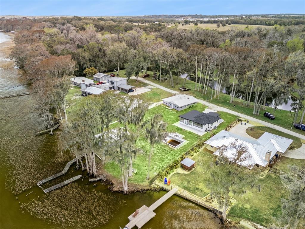 28055 Leuty Road Yalaha, FL 34797 - Photo 29 of 39 a view of a yard with an outdoor space