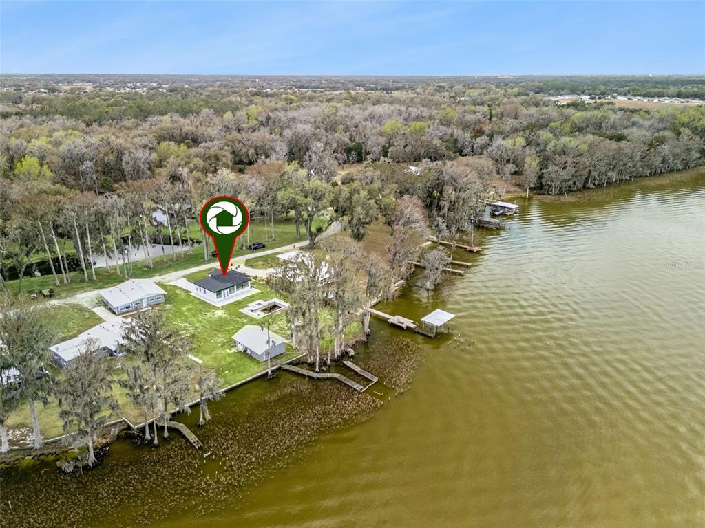 28055 Leuty Road Yalaha, FL 34797 - Photo 34 of 39 an aerial view of a house with a ocean view