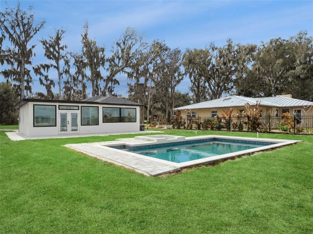 28055 Leuty Road Yalaha, FL 34797 - Photo 38 of 39 a view of outdoor space yard and swimming pool