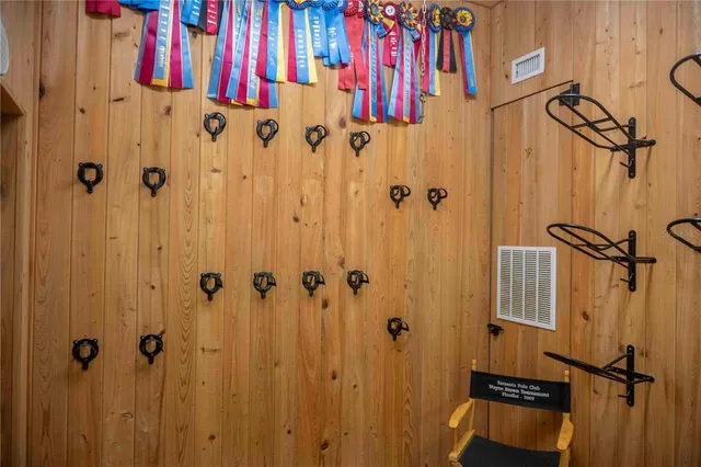 a kitchen with stainless steel appliances a stove a sink a refrigerator and cabinets