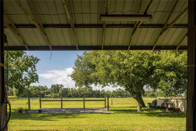 a stairs of a house with wooden fence