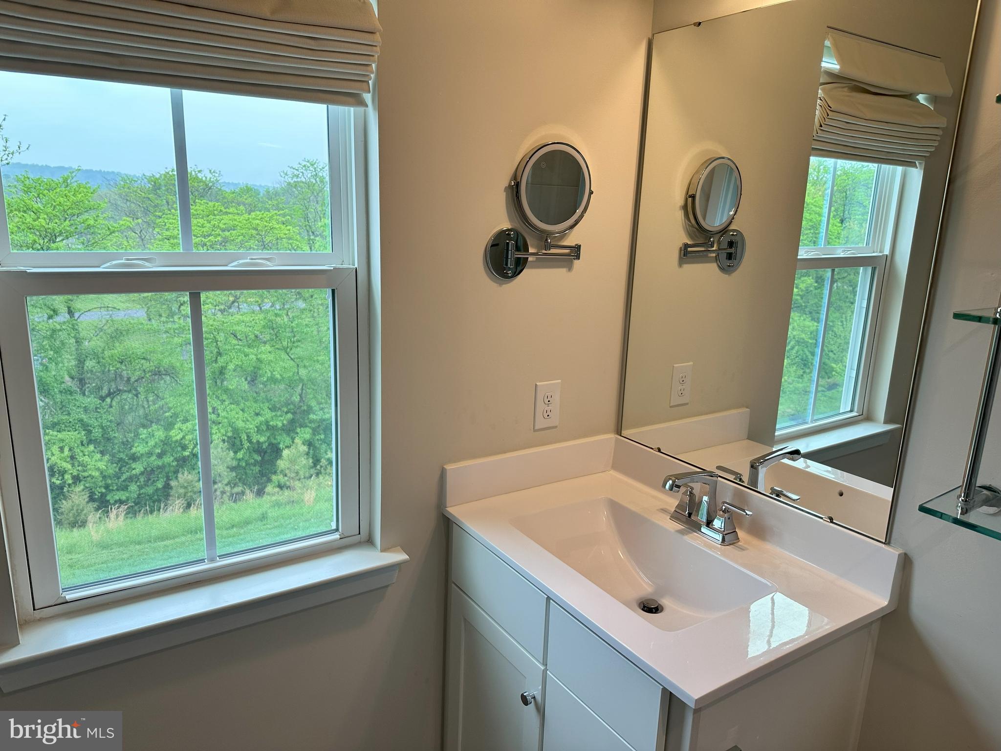 463 Paperbark Square Downingtown, PA 19335 - Photo 14 of 20 a bathroom with a sink and a mirror