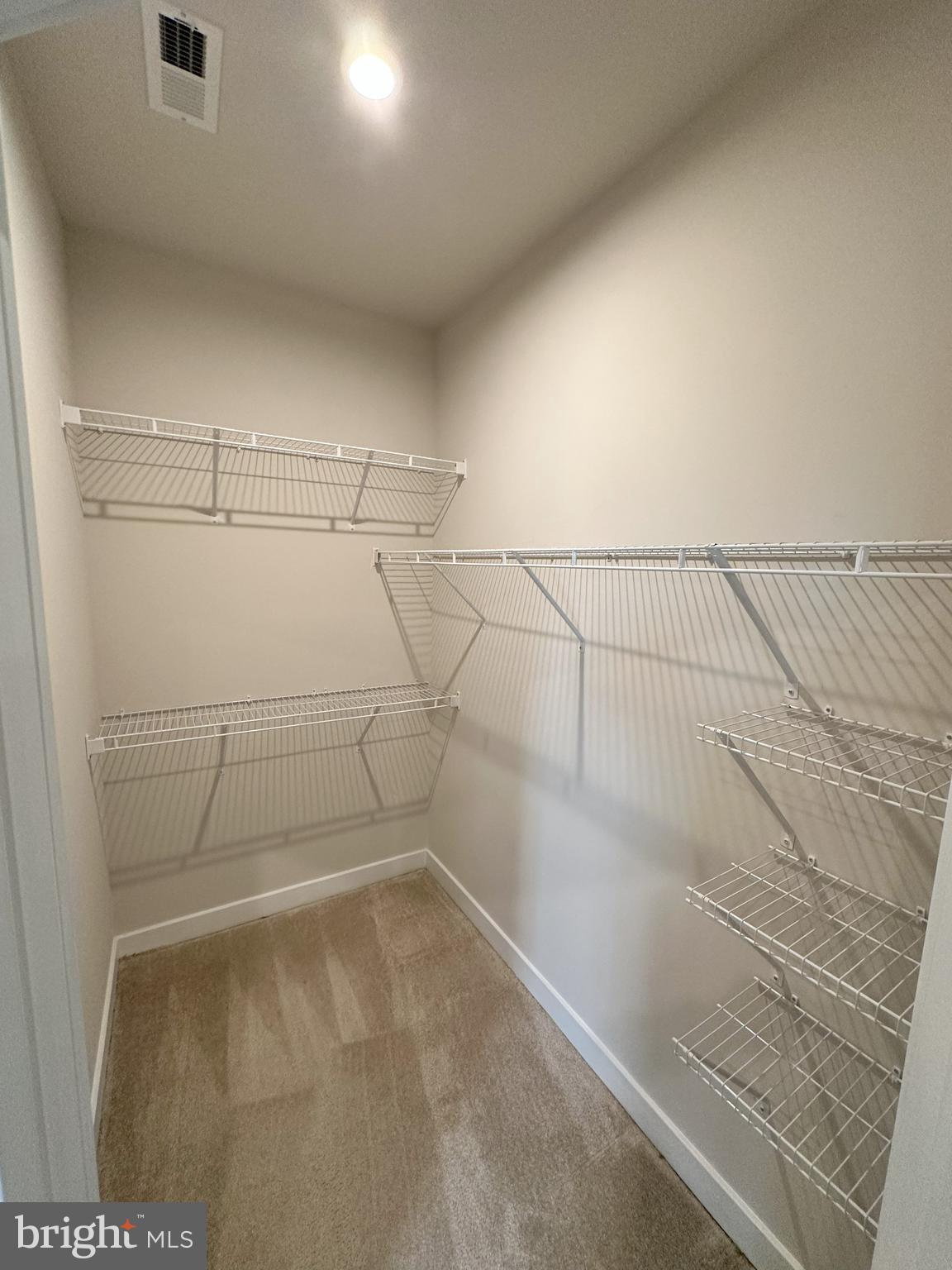 463 Paperbark Square Downingtown, PA 19335 - Photo 15 of 20 a view of a room with racks on the wall