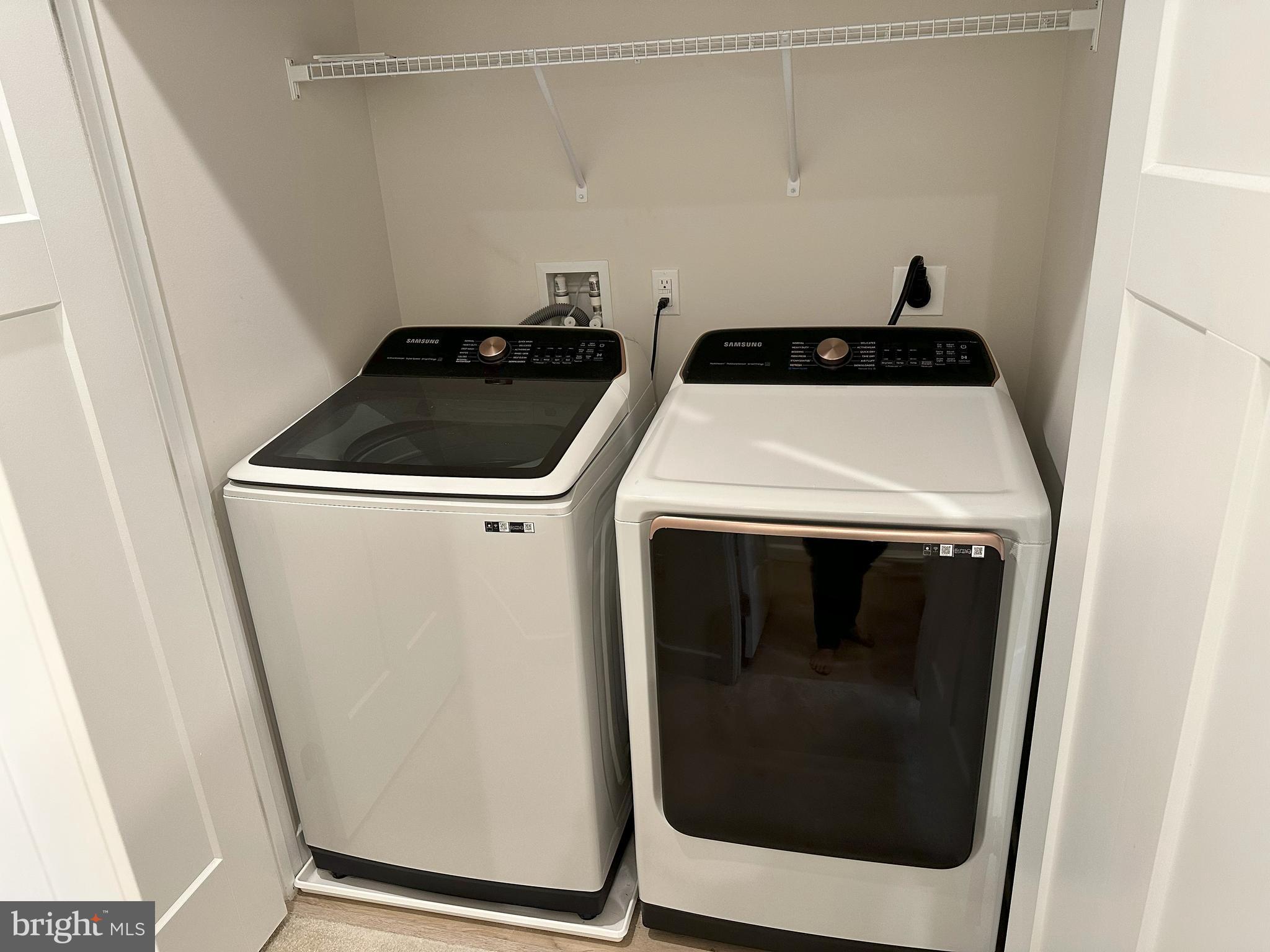 463 Paperbark Square Downingtown, PA 19335 - Photo 19 of 20 a close up view of a washer and dryer