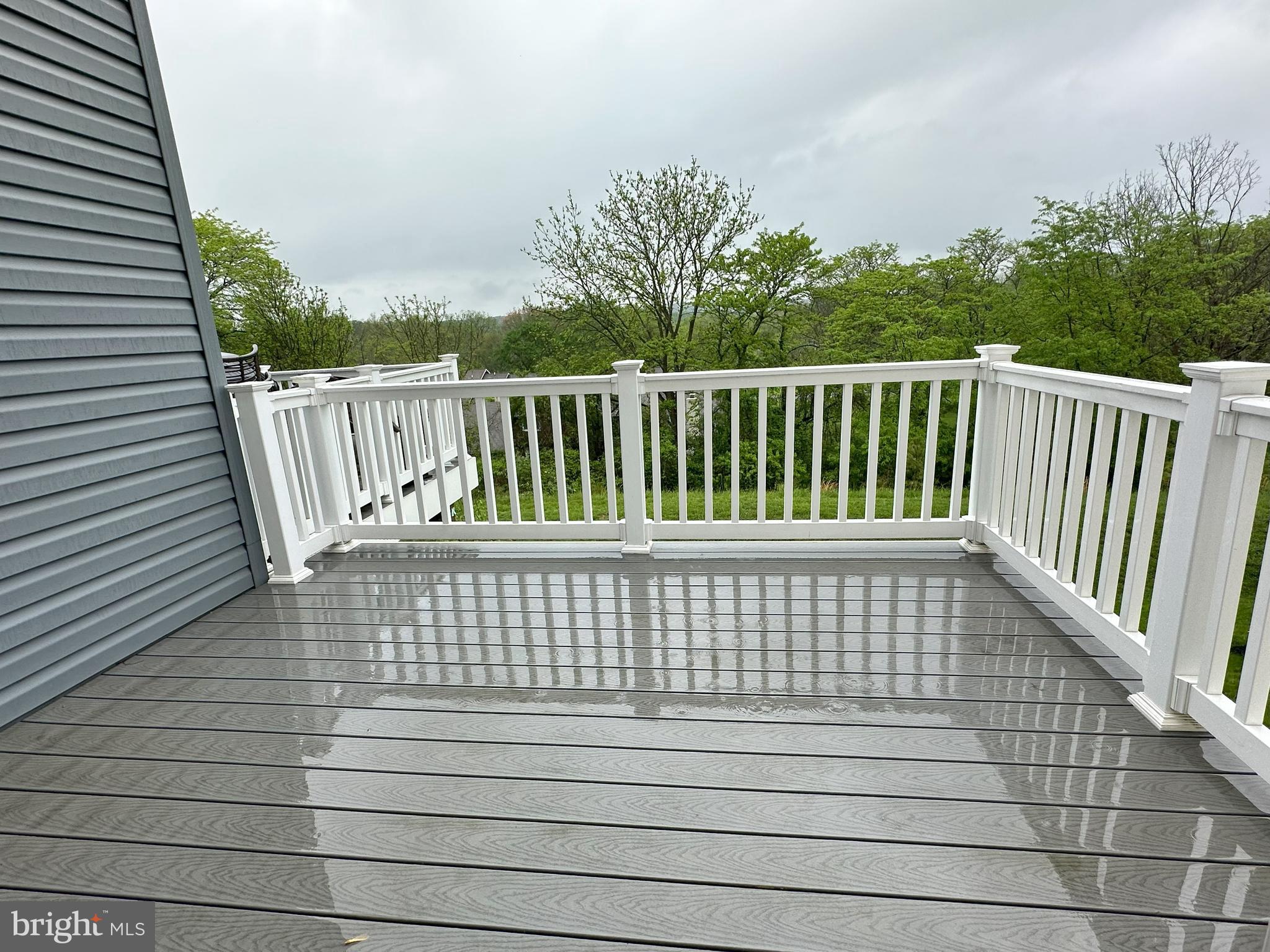 463 Paperbark Square Downingtown, PA 19335 - Photo 10 of 20 a view of balcony with wooden floor
