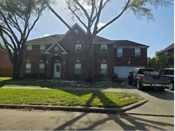 a view of yard with car parked