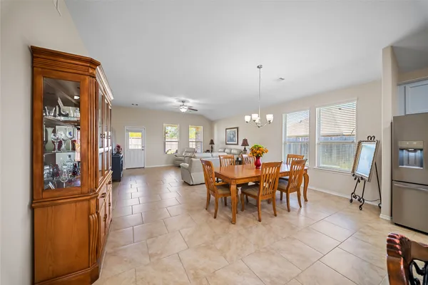 a view of a dining room with furniture