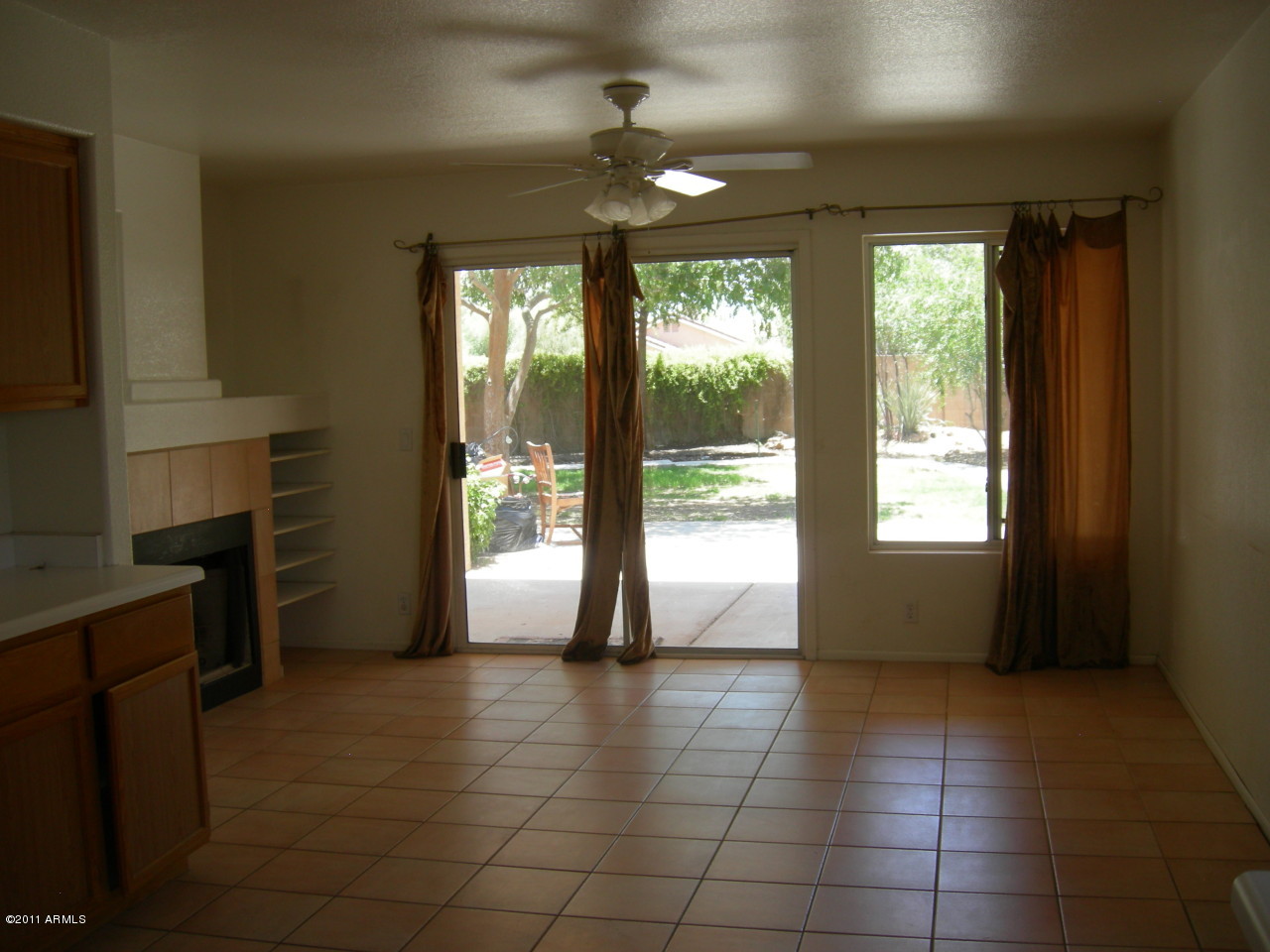 3213 East Marco Polo Road Phoenix, AZ 85050 - Photo 18 of 30 a view of an empty room with a window