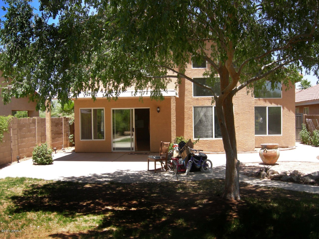 3213 East Marco Polo Road Phoenix, AZ 85050 - Photo 24 of 30 a front view of a house with a yard