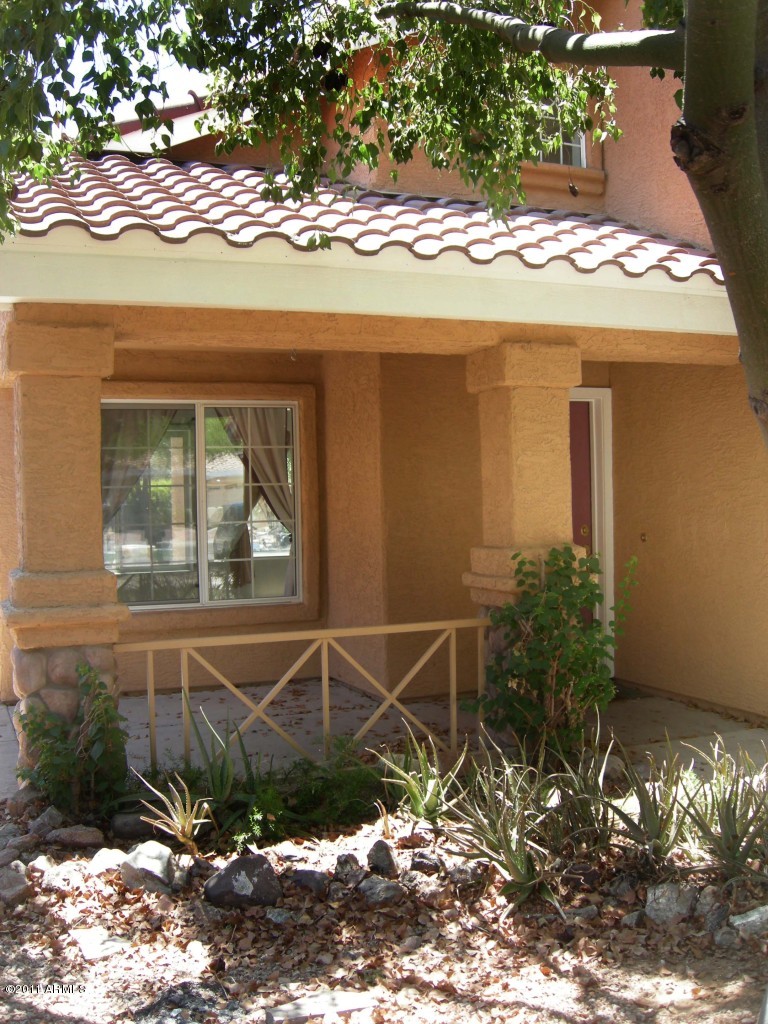 3213 East Marco Polo Road Phoenix, AZ 85050 - Photo 3 of 30 a front view of a house