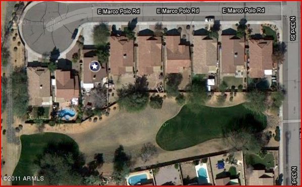 3213 East Marco Polo Road Phoenix, AZ 85050 - Photo 4 of 30 an aerial view of a house with outdoor space swimming pool and outdoor seating