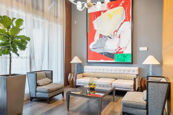a view of a living room and dining room