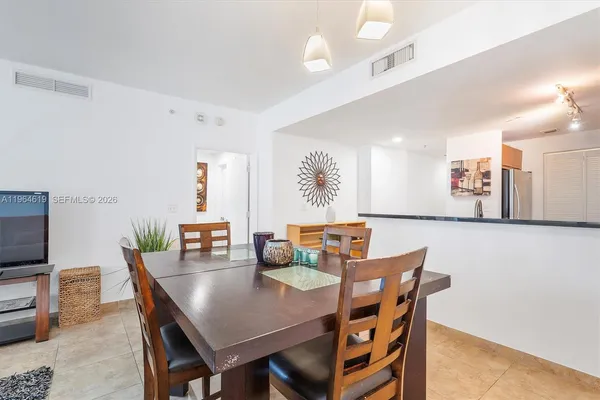 a view of a dining room with furniture