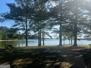 a front view of building with yard