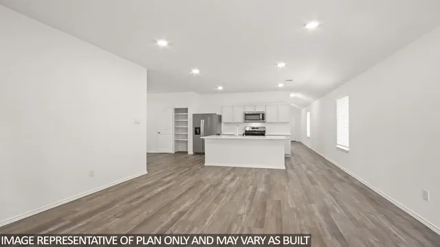 a view of kitchen with wooden floor