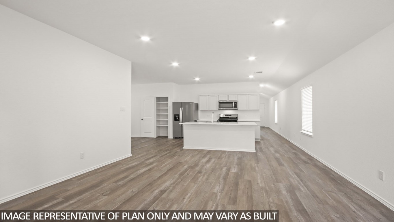 1706 Portia Lane Conroe, TX 77301 - Photo 3 of 21 a view of kitchen with wooden floor