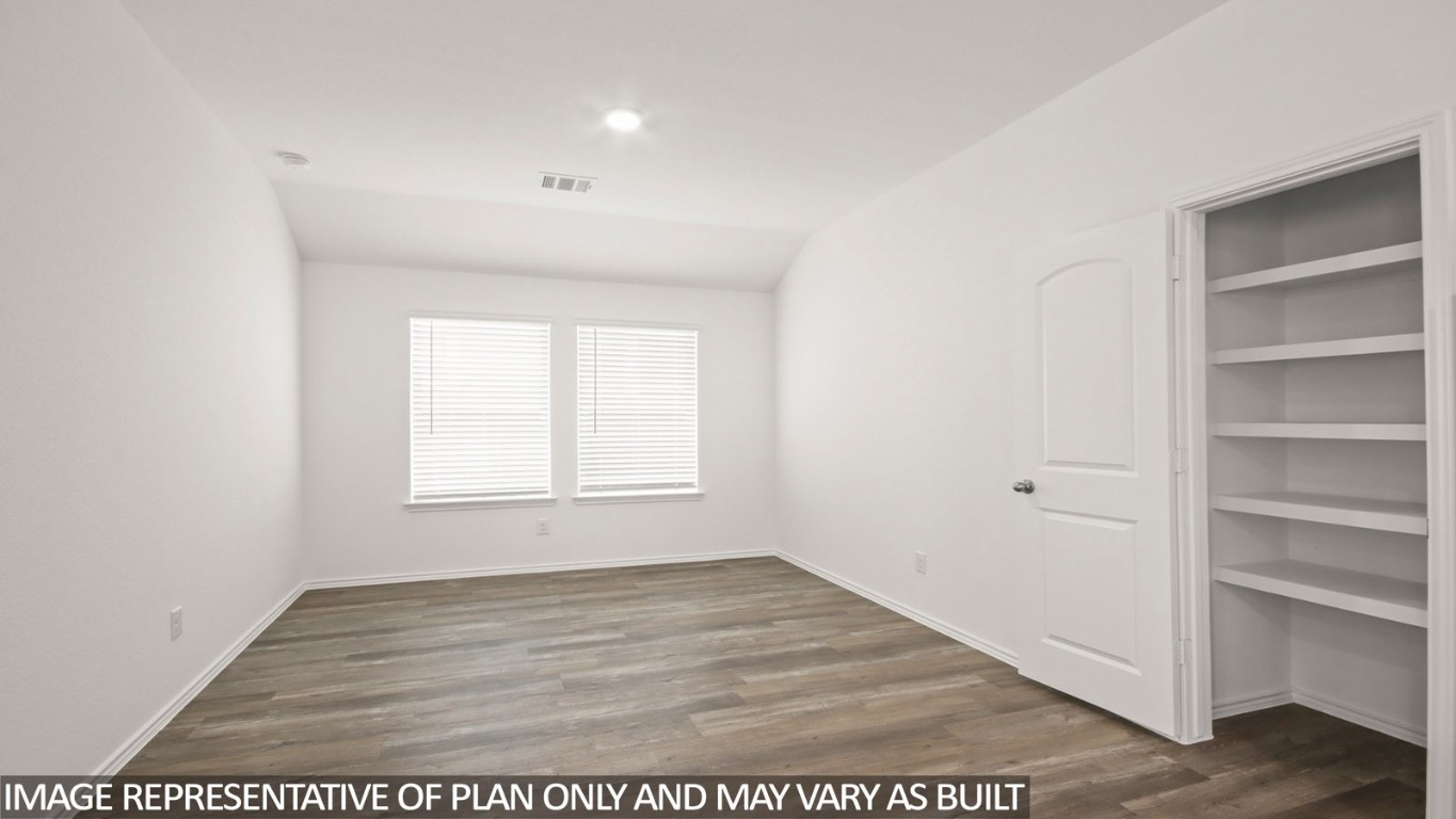 1706 Portia Lane Conroe, TX 77301 - Photo 5 of 21 a view of an empty room with a window