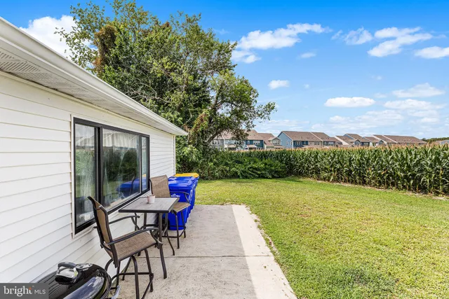 a garden view with a seating space